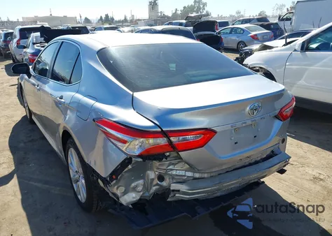 2018 Toyota Camry Le from USA, damaged, VIN 4T1B11HK4JU055929